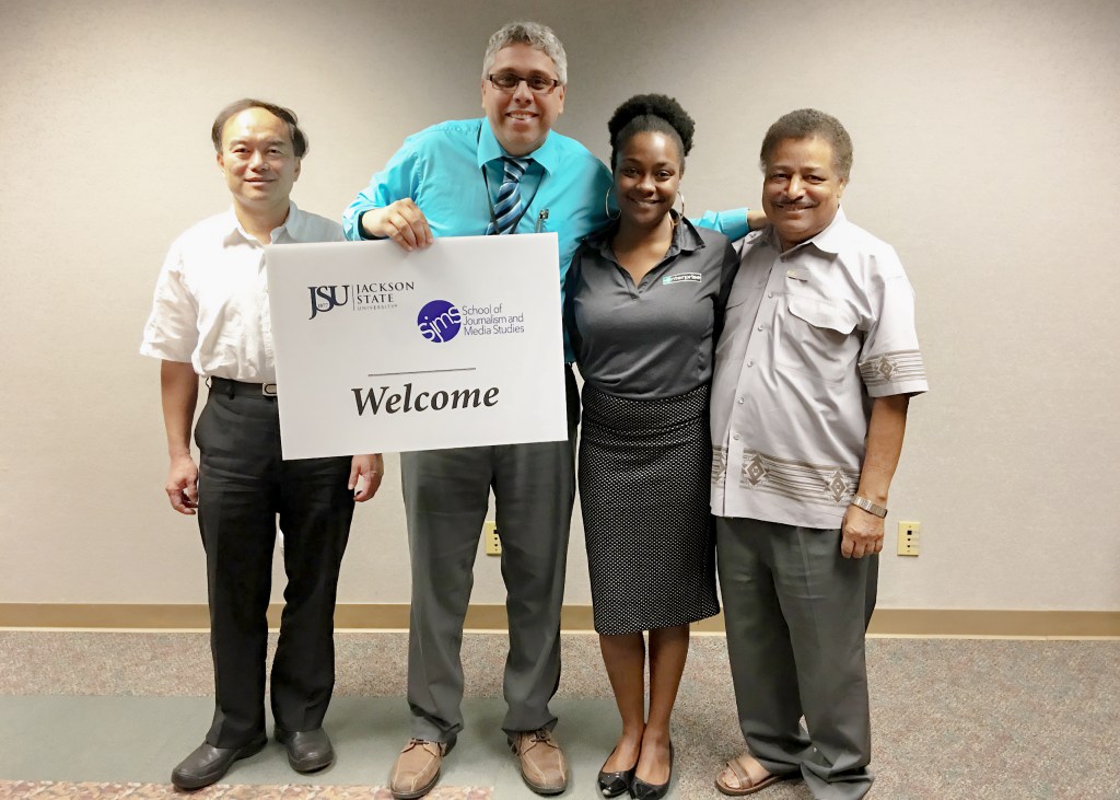 Photo of Luis Camillo and  JSU Staff. 